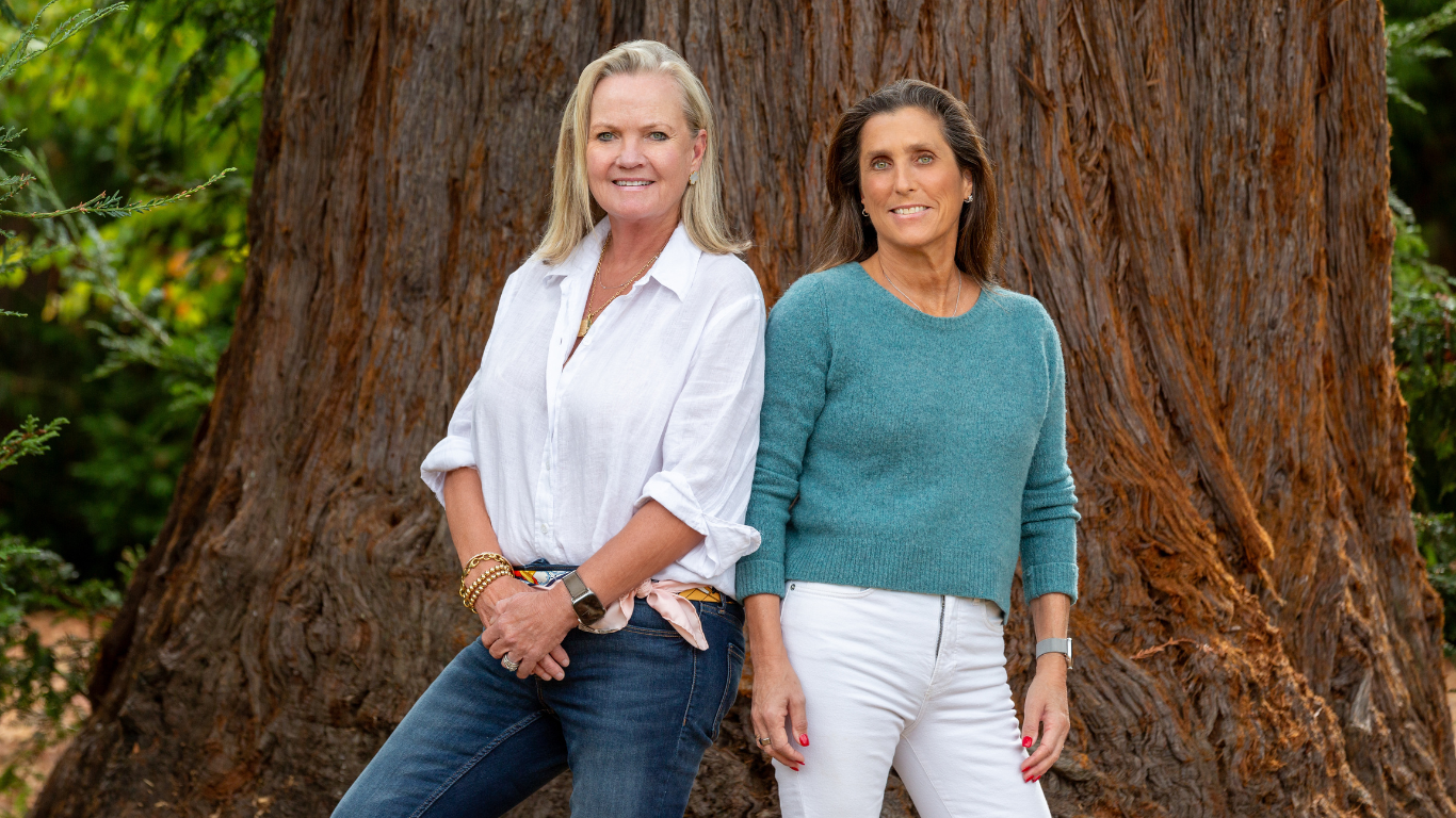 Laura and Kristin in front of redwood tree